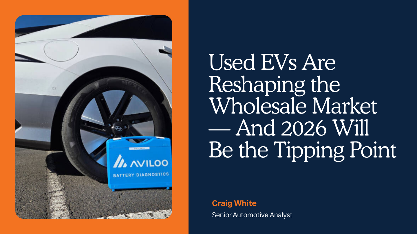 image of used EV at auction getting a battery inspection